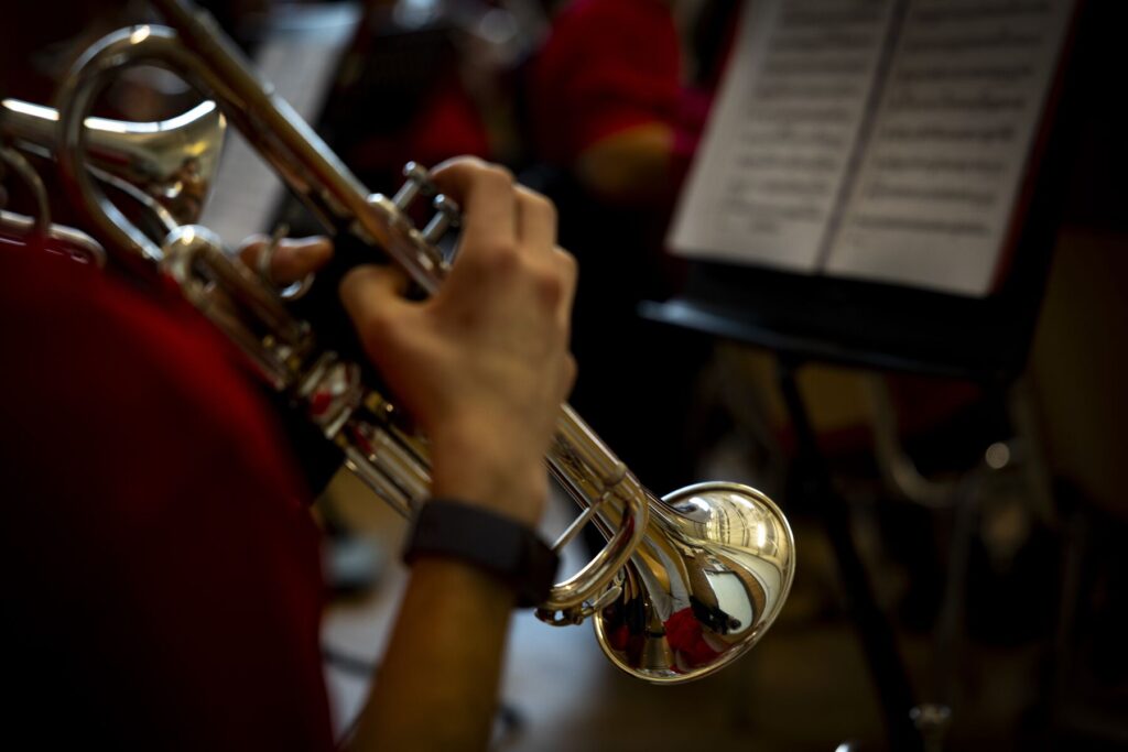 Cadet playing a trumpet, music, Rourkes Drift concert
